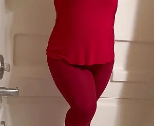 Molten nymph desperate to urinate in taut crimson yoga trousers