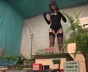 Chinese giantess domme kicking city in stilettos and stocking